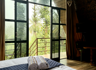 A-frame cottage interior at Cascara Coffee Cottages, Wayanad